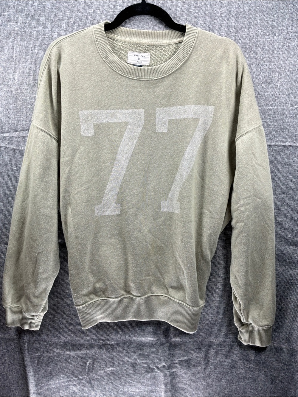 American Eagle Outfitters Crewneck Sweatshirt in Sage Green with '77' Graphic